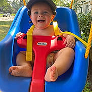 Jax is registered to the contest to win money with this photo: baby, backyard, car, clothing, face, grass, hat, head, nature, outdoorplayarea, outdoors, park, person, photography, plant, playarea, portrait, summer, transportation, vehicle