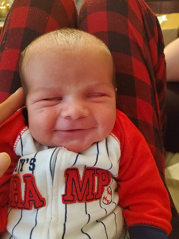 Coby is registered to the contest to win money with this photo: baby, baby_toddler_clothing, cheek, chin, eye, eyebrow, face, forehead, hairstyle, happy, head, lip, mammal, mouth, nose, person, skin, sleeve, smile, tartan