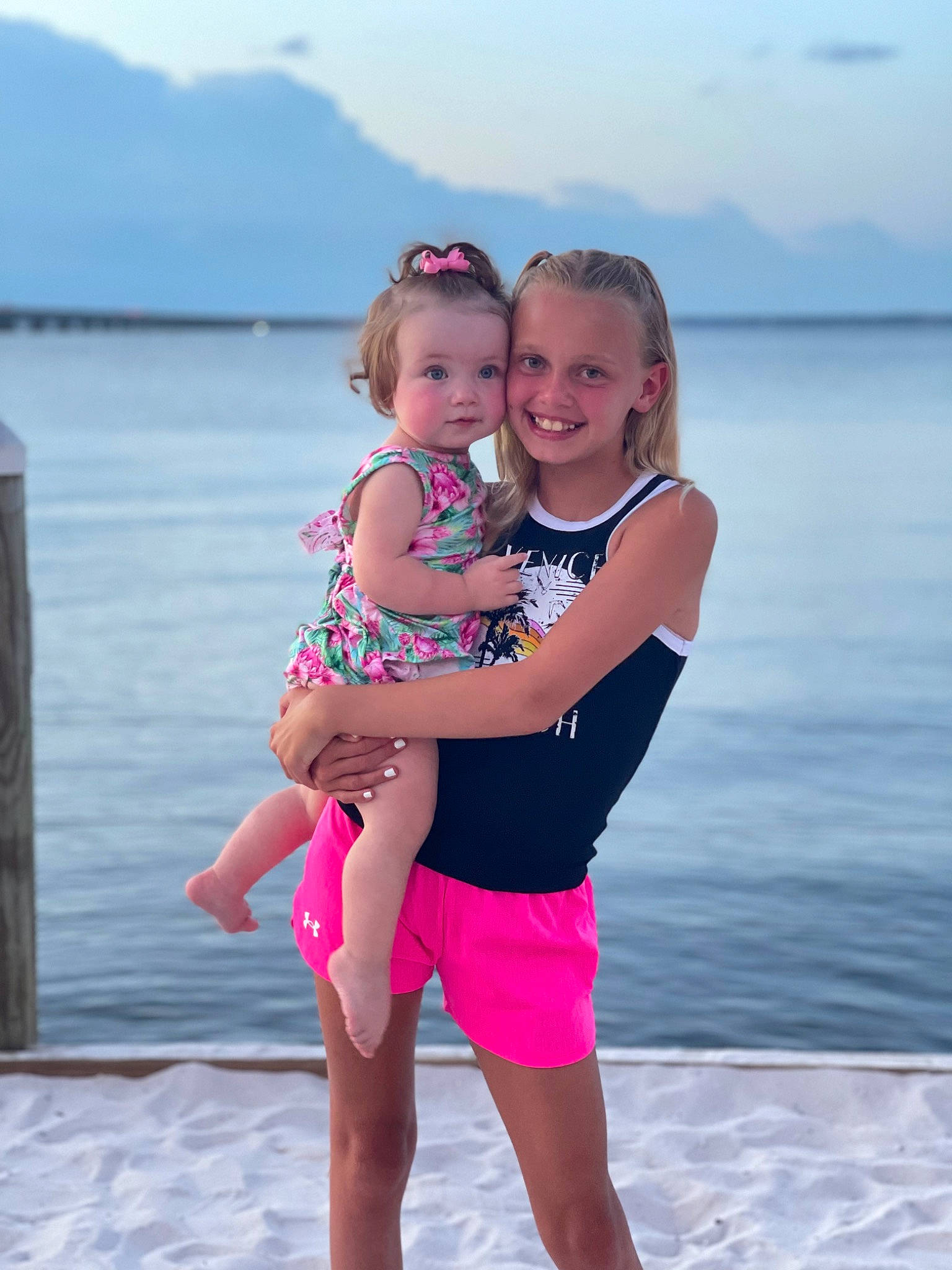 Autumn joined the competition — help win amazing prizes! azure, body_of_water, face, fun, gesture, happy, joy, lake, leisure, people_in_nature, people_on_beach, person, photograph, pink, sky, smile, summer, thigh, toddler, travel