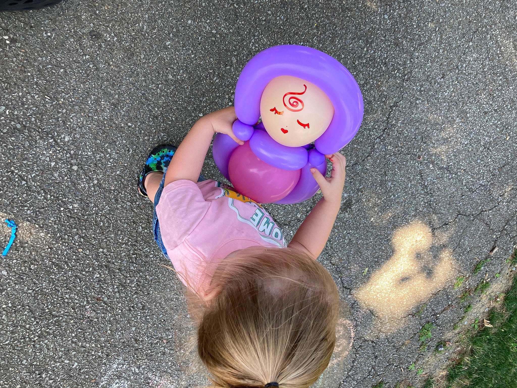 Halley joined the competition — help win amazing prizes! balloon, child, electric_blue, fun, gesture, grass, happy, head, human_leg, leisure, magenta, nail, party_supply, people_in_nature, person, play, recreation, sitting, thumb, toddler