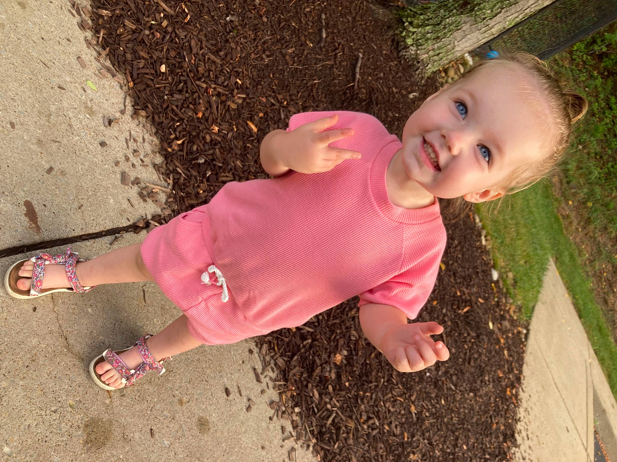 Halley is registered to the contest to win money with this photo: baby, baby_toddler_clothing, beauty, fun, grass, happy, human_leg, joy, leg, leisure, magenta, pattern, people_in_nature, person, pink, play, sandal, smile, soil, spring