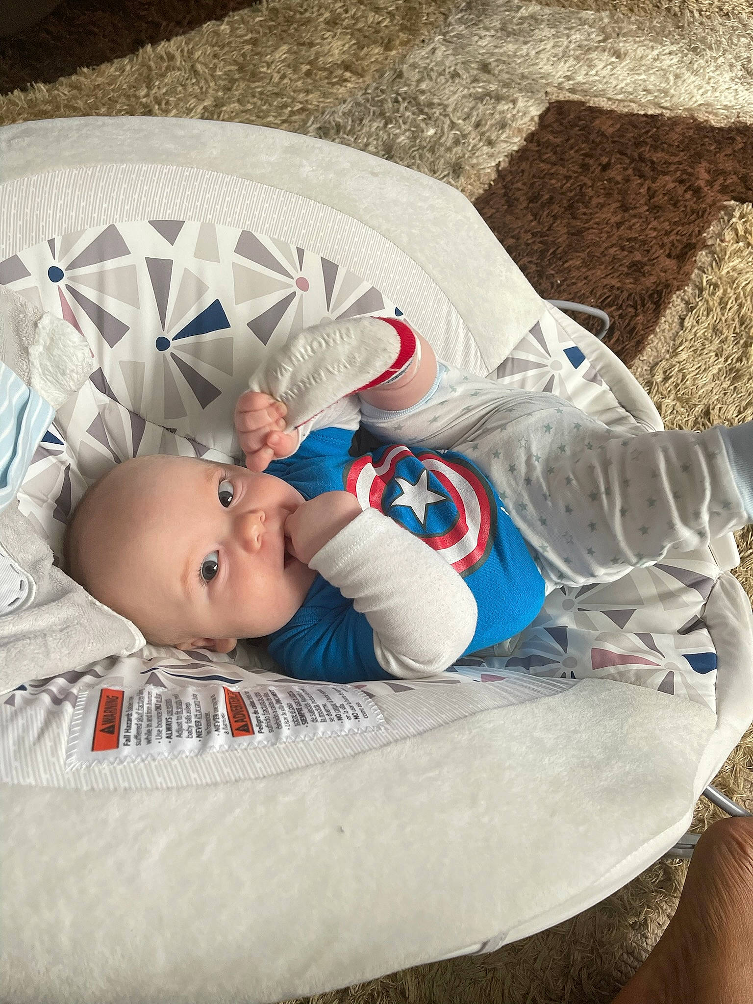 Marcellus is registered to the contest to win money with this photo: baby, baby_carriage, baby_products, baby_sleeping, baby_toddler_clothing, bedtime, child, comfort, grass, hat, head, linens, nap, pattern, person, room, sitting, sleep, textile, toddler