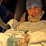 Adrien a rejoint le concours — aidez-le/la à gagner de superbes lots ! baby, beanie, blanket, bundle, car_seat, child, clothing, cozy, cute, expression, face, hat, indoors, infant, newborn, person, seatbelt, sitting, soft, warm
