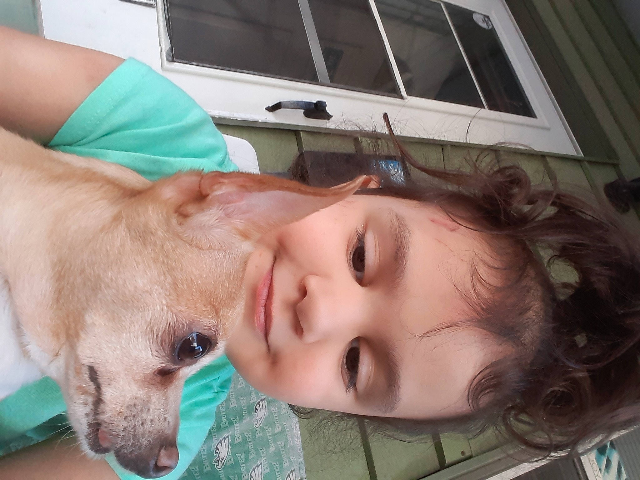 Lavinia is registered to the contest to win money with this photo: carnivore, chest, child, companion_dog, dog, dog_breed, ear, eyelash, eyewear, happy, jaw, joy, lip, nose, organ, person, selfie, skin, smile, sporting_group