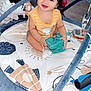 Zeus joined the competition — help win amazing prizes! baby, child, curly_hair, smiling, indoor, play_mat, toy, sitting, floor, wooden_floor, yellow_clothing, sock, happy, person, playtime, cute, infant, bright_eyes, home, cozy