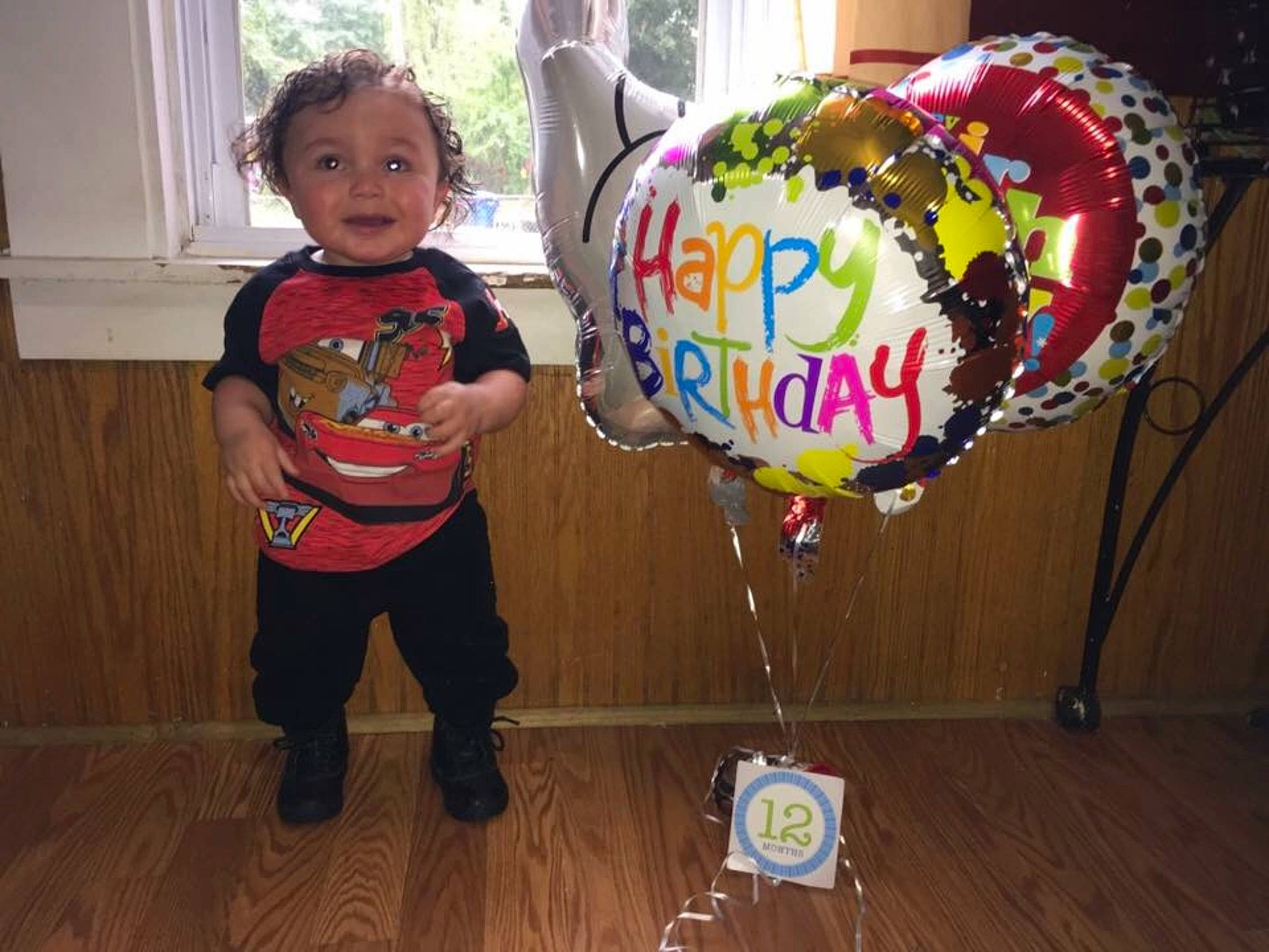 Anthony is registered to the contest to win money with this photo: balloon, child, event, fun, party_supply, person, play, recreation, toddler, toy