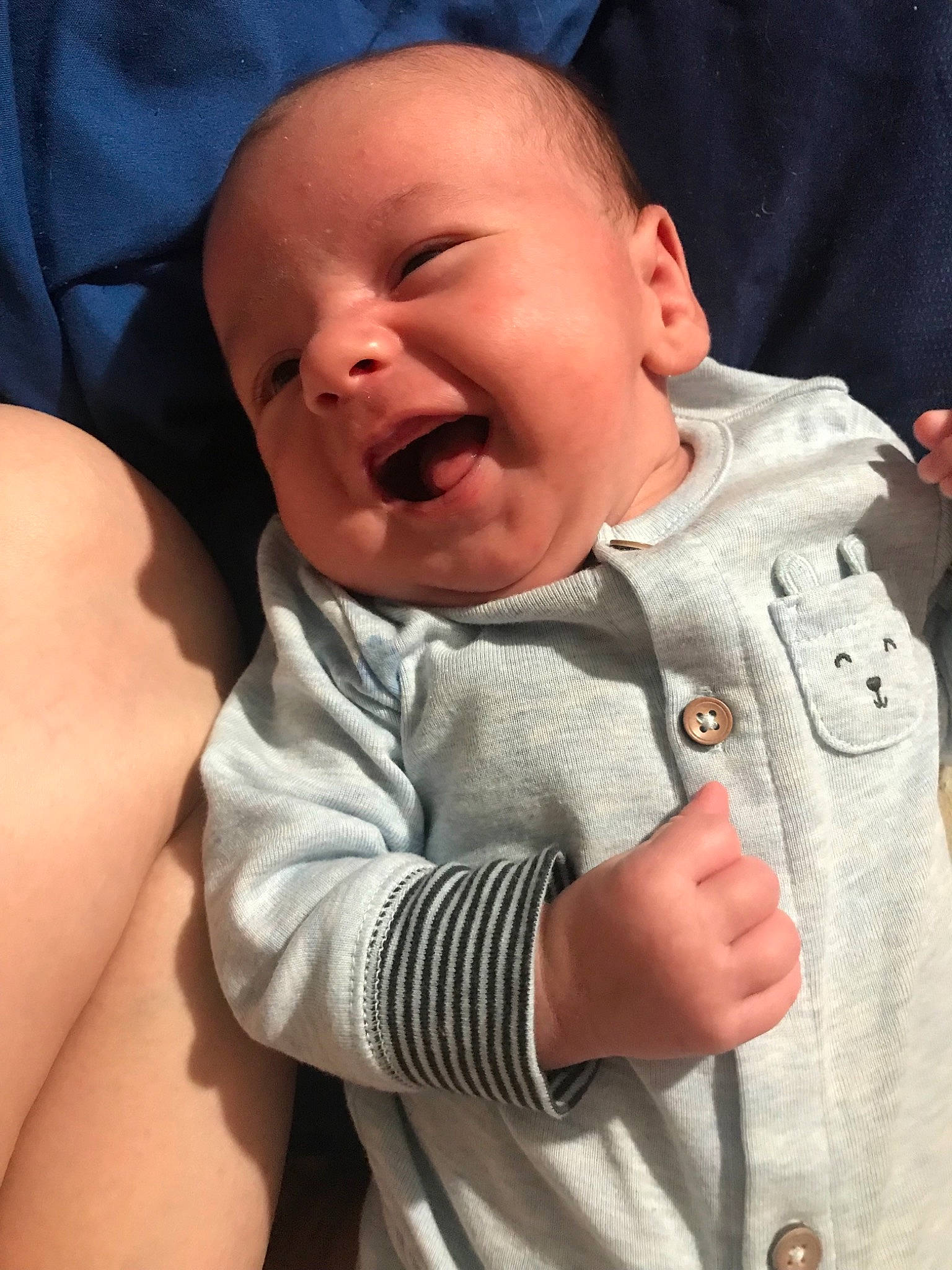 Ellis is registered to the contest to win money with this photo: cheek, child, chin, ear, face, finger, hand, head, infant, mouth, neck, nose, person, product, skin, smile, thumb, toddler, yawn