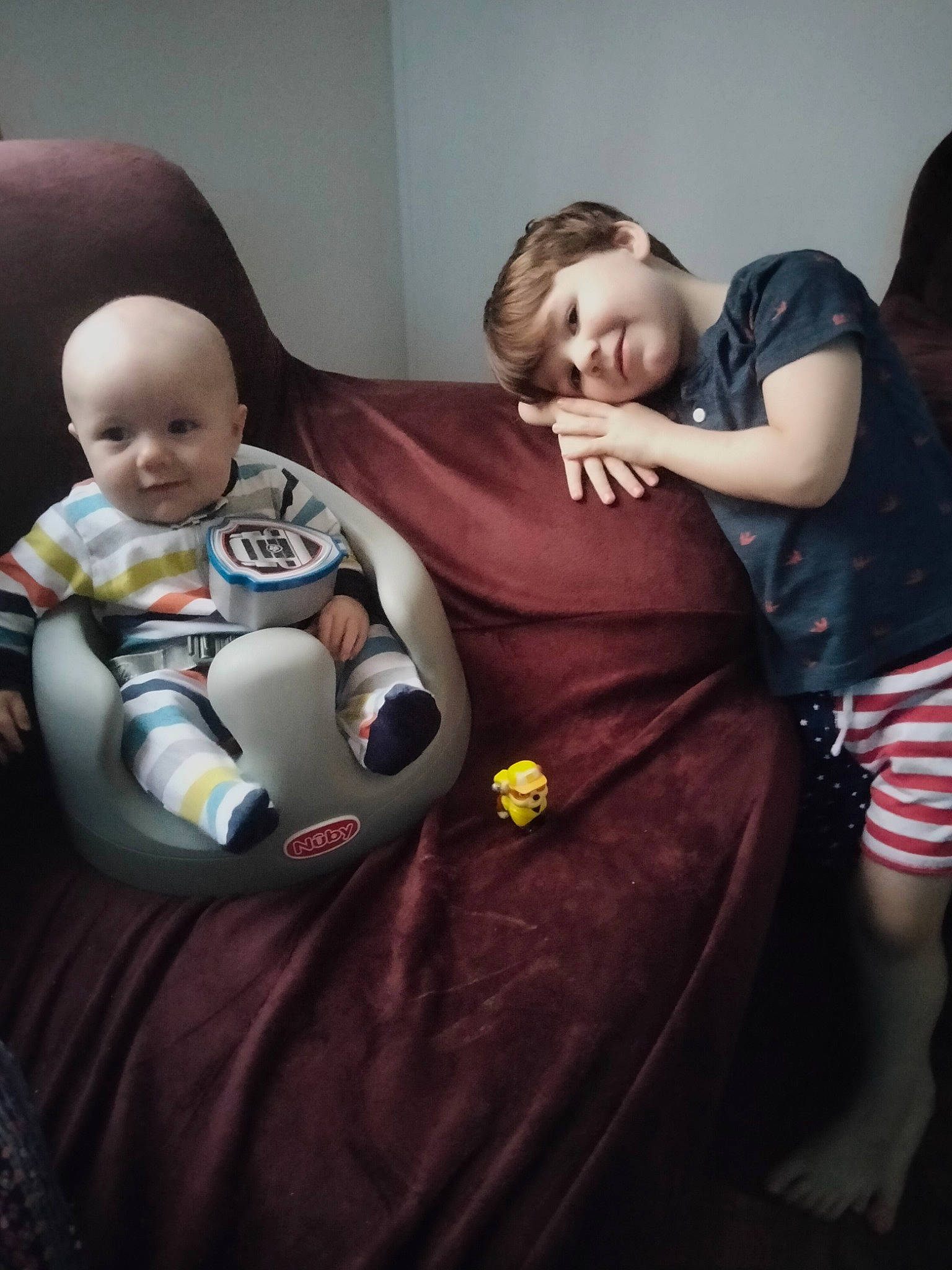 Jason joined the competition — help win amazing prizes! arm, baby, child, comfort, couch, eye, face, flash_photography, flooring, fun, happy, human_leg, joy, linens, mouth, person, room, sitting, skin, t_shirt