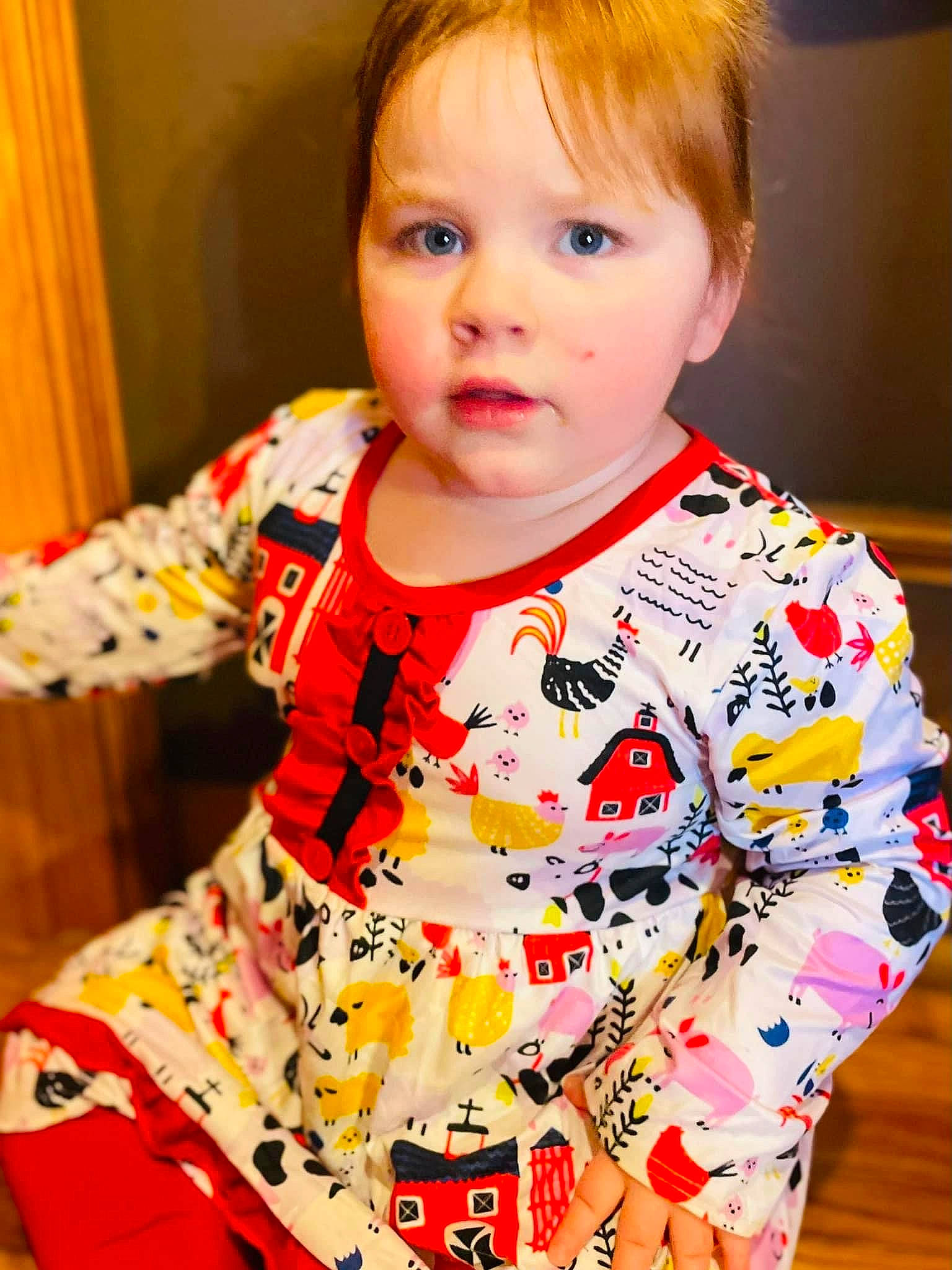 Ella is registered to the contest to win money with this photo: baby, baby_toddler_clothing, cheek, child, curtain, event, face, fun, hairstyle, happy, head, iris, nose, person, play, shirt, sitting, skin, sleeve, t_shirt