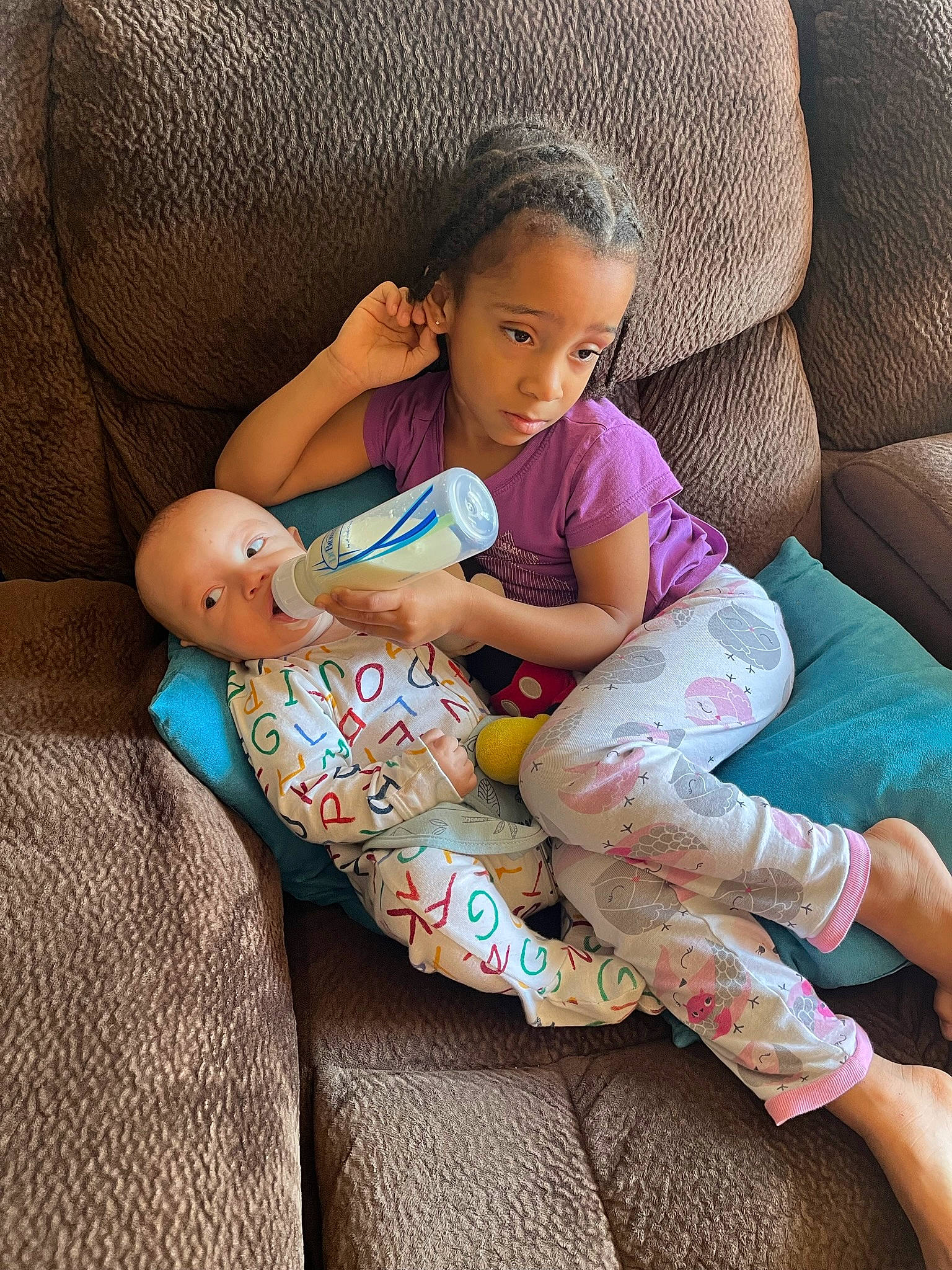 Jane Marie joined the competition — help win amazing prizes! baby, blond, child, comfort, finger, foot, fun, human_body, human_leg, knee, lap, leg, leisure, person, sitting, skin, sunglasses, textile, thigh, toddler