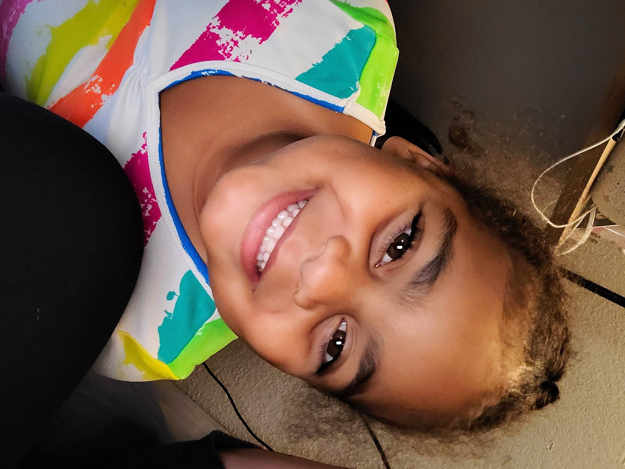 Zaniyah is registered to the contest to win money with this photo: child, chin, cool, eye, eyebrow, eyelash, face, flash_photography, fun, grass, happy, head, iris, joy, leisure, lip, mouth, nose, person, skin