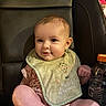 Ryleigh joined the competition — help win amazing prizes! baby, infant, smile, bib, clothing, sitting, leather_chair, bottle, cute, happy, child, face, skin, person, indoors, young, expression, hand, foot, portrait