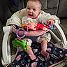 Ryleigh joined the competition — help win amazing prizes! baby, smiling, baby_rocker, toy, monkey_toy, frog_toy, blanket, couch, floor, clothing, foot, hand, infant, happy, indoor, seat, fabric, pattern, person, child