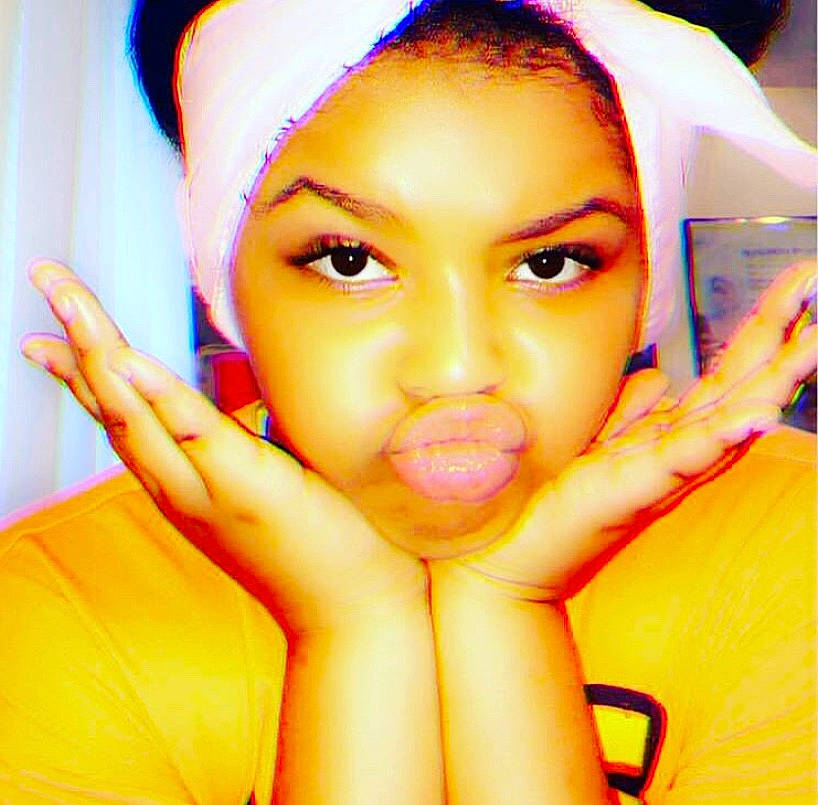 Cherish is registered to the contest to win money with this photo: beauty, cheek, close_up, eye, eyebrow, eyelash, face, finger, forehead, gesture, hand, head, lip, nose, person, skin, thumb, yellow