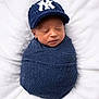 Preston Bradley joined the competition — help win amazing prizes! baby, baseballcap, beanie, blanket, bonnet, cap, clothing, face, hat, head, knitwear, newborn, people, person, photography, portrait, sad, sleeping, sweater, yawning