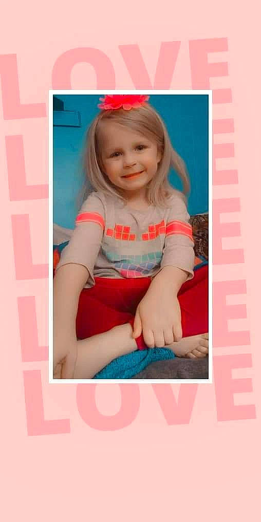 Sylvia is registered to the contest to win money with this photo: baby, baby_toddler_clothing, child, dress, electric_blue, face, flash_photography, font, fun, happy, human_body, joy, magenta, pattern, person, pink, sitting, sleeve, smile, stock_photography