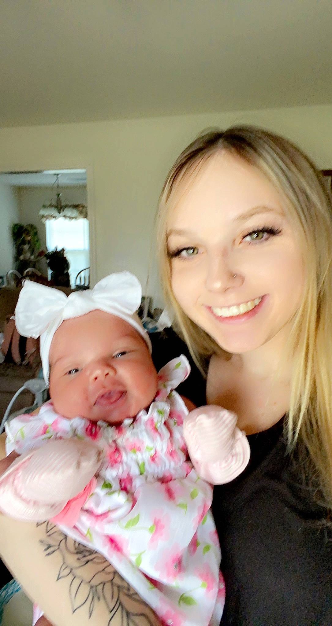 Kayloni is registered to the contest to win money with this photo: baby, baby_toddler_clothing, cap, cheek, child, chin, event, eye, facial_expression, fun, gesture, happy, hat, headwear, human, joy, layered_hair, lip, person, sitting