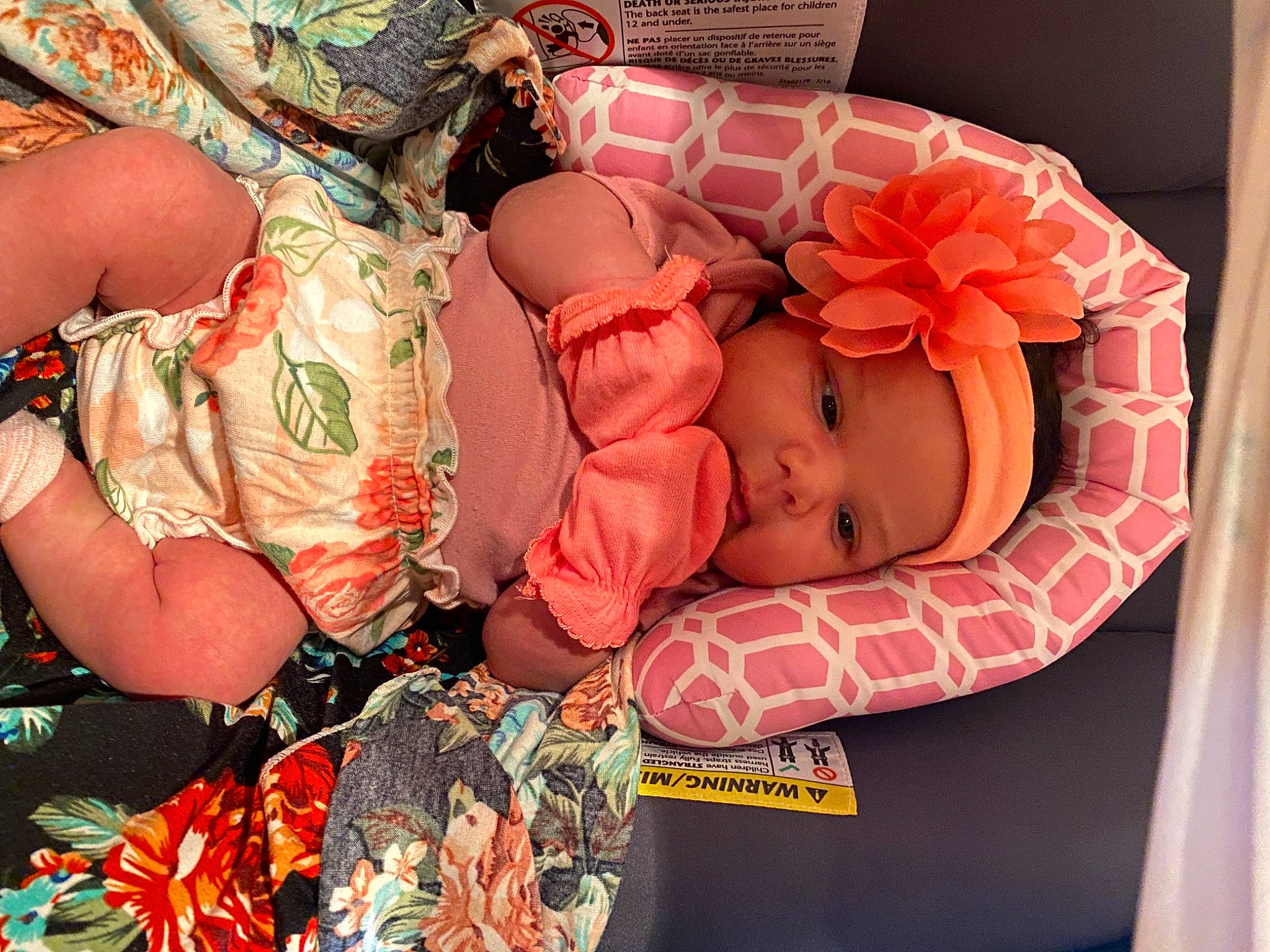 Kayloni is registered to the contest to win money with this photo: abdomen, baby, baby_toddler_clothing, bangle, child, glasses, hand, headwear, human_body, human_leg, jewellery, leg, mouth, nail, orange, pattern, person, textile, thigh, toddler