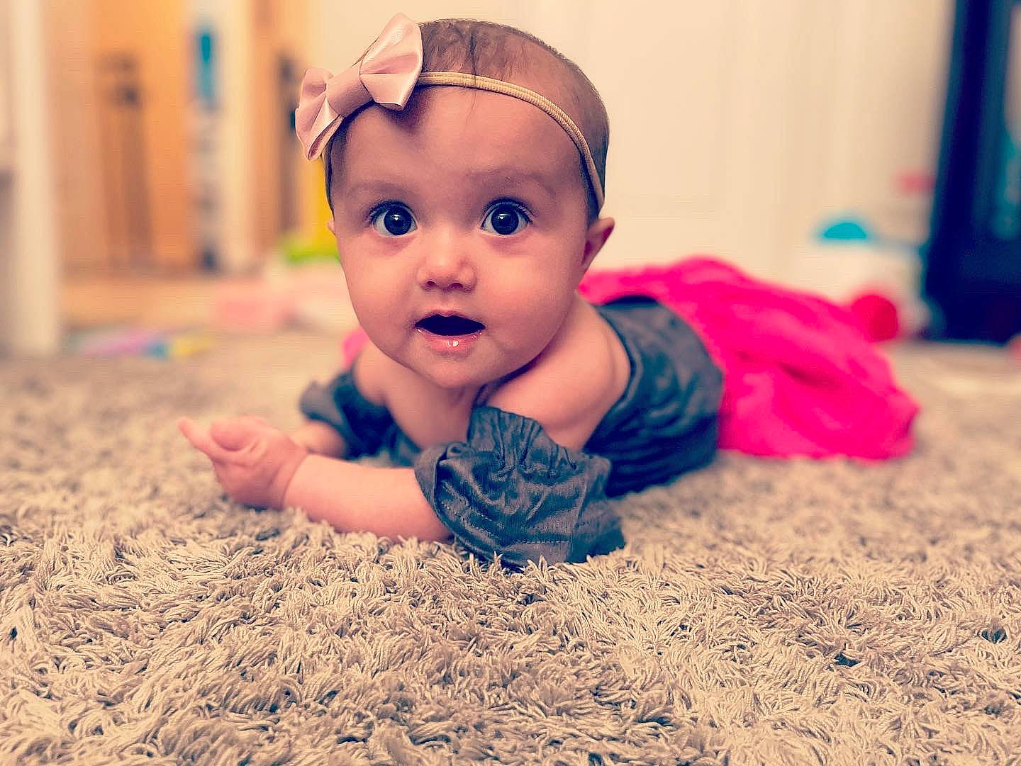 Kenslie is registered to the contest to win money with this photo: baby, baby_toddler_clothing, cap, cheek, child, crawling, face, flooring, fun, grass, happy, iris, people_in_nature, person, sand, sitting, skin, smile, soil, surprise