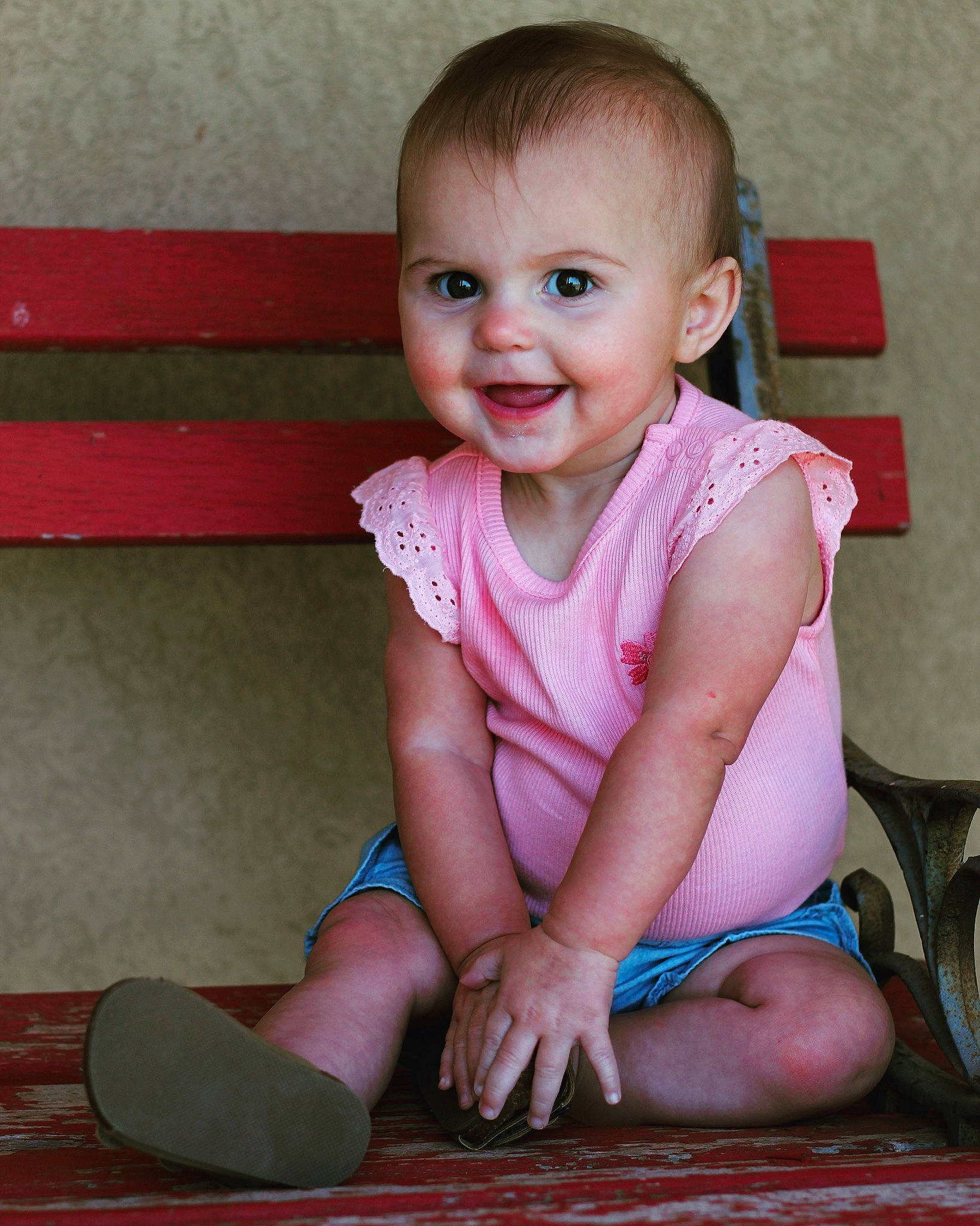 Kenzie is registered to the contest to win money with this photo: baby, baby_toddler_clothing, cheek, child, chin, eye, face, finger, floor, flooring, happy, iris, joint, joy, mouth, person, pink, skin, sleeve, smile