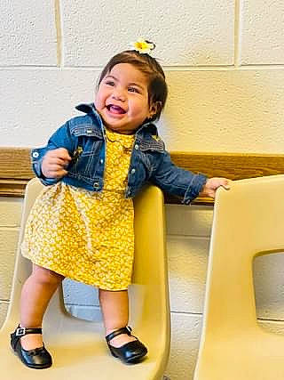 Natalie joined the competition — help win amazing prizes! baby_toddler_clothing, child, electric_blue, fun, happy, human_leg, knee, leisure, person, recreation, room, sandal, shoe, sitting, smile, snapshot, sneakers, sock, toddler, travel