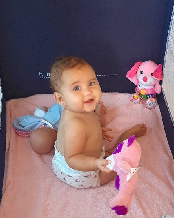 Jade participe au concours pour gagner de l'argent avec cette photo : abdomen, baby, baby_products, baby_toddler_clothing, cheek, chest, diaper, eye, finger, head, human_body, joint, person, pink, skin, stomach, thigh, thumb, toddler, toy