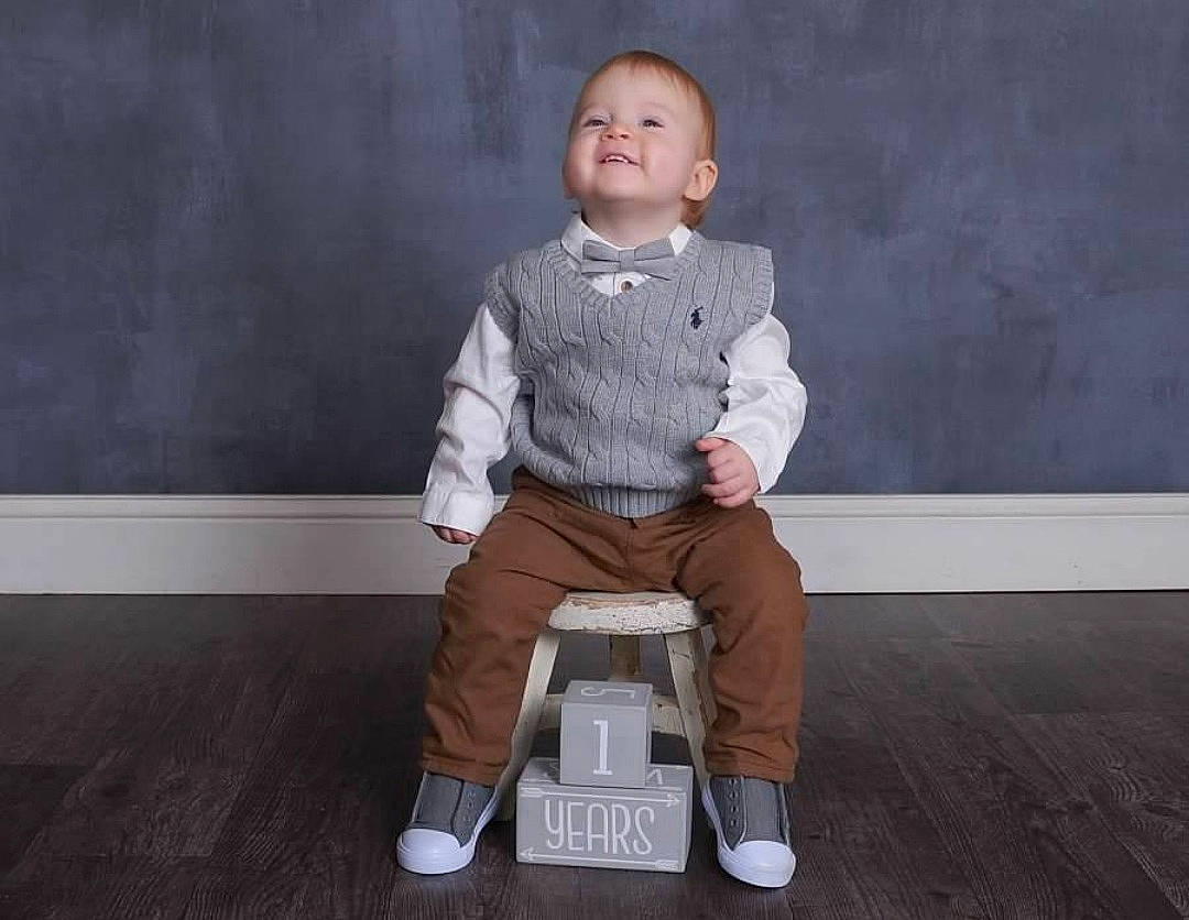 Kevin joined the competition — help win amazing prizes! baby, baby_toddler_clothing, dress_shirt, flash_photography, flooring, formal_wear, fun, happy, home_appliance, joy, knee, pattern, person, portrait, portrait_photography, room, sitting, sleeve, smile, toddler