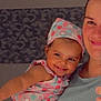 Keylah participe au concours pour gagner de l'argent avec cette photo : toddler, child, adult, smile, dress, headscarf, polka_dot, holding, happy, portrait, indoor, person, clothing, pattern, hand, face, skin, cute, family, warmth