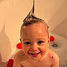 toddler, child, bath, bubbles, shampoo, hair_spike, smile, happy, water, skin, toy, red, playful, cute, face, indoors, bathroom, head, childhood, fun