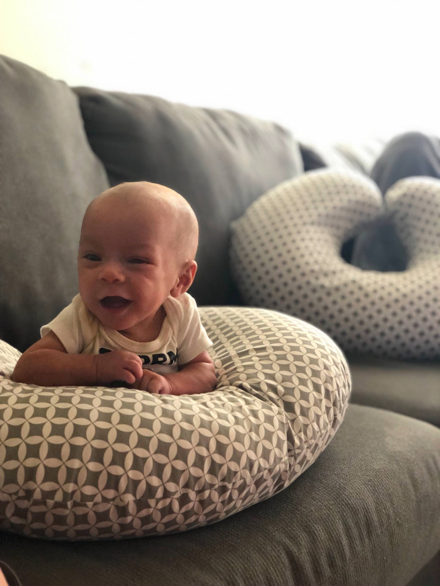 Jovanni is registered to the contest to win money with this photo: baby, bean_bag, bean_bag_chair, child, comfort, furniture, person, sitting, smile, toddler