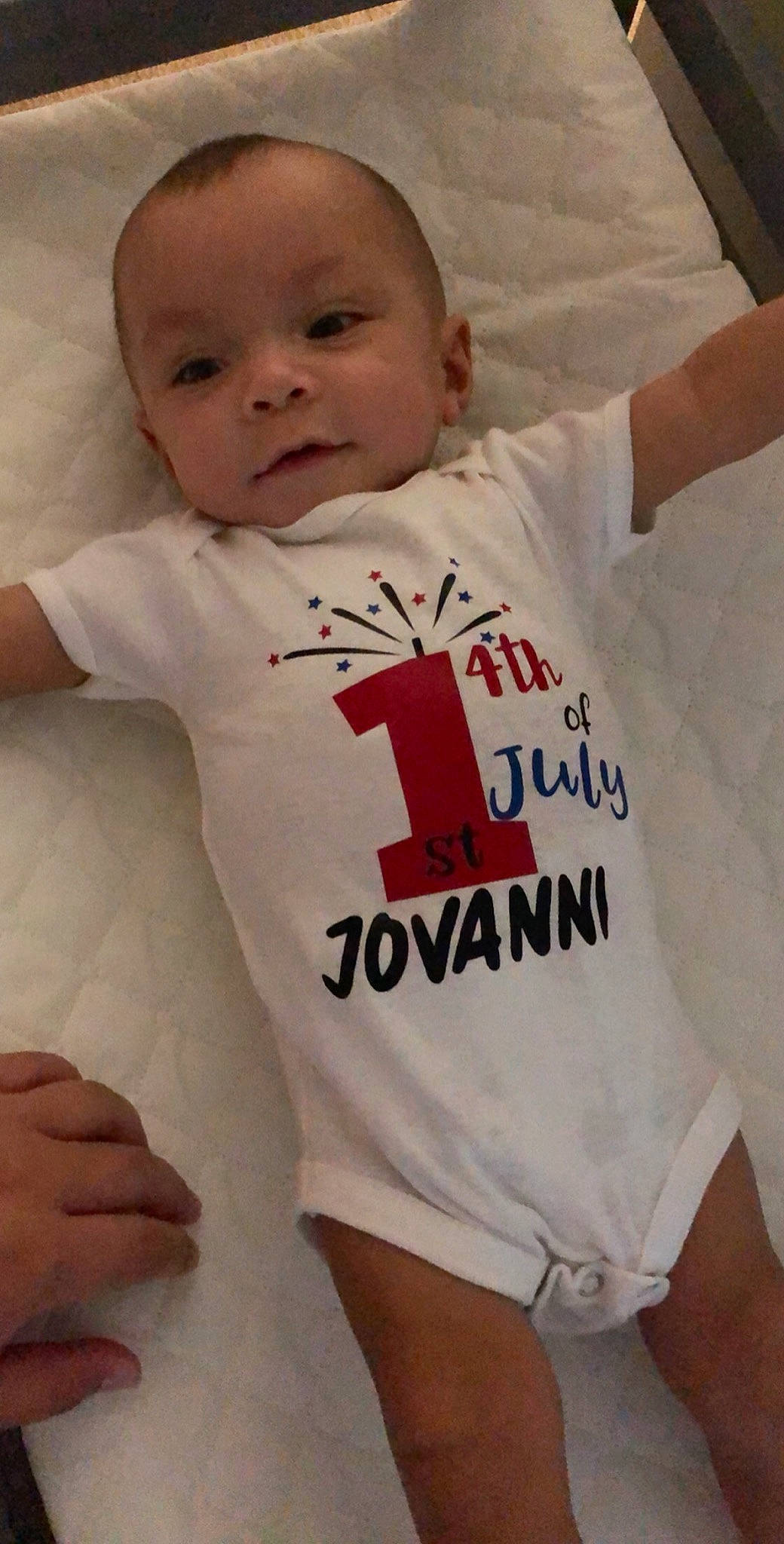Jovanni is registered to the contest to win money with this photo: baby, baby_products, baby_toddler_clothing, cheek, child, cool, infant_bodysuit, person, product, sleeve, t_shirt, toddler, top