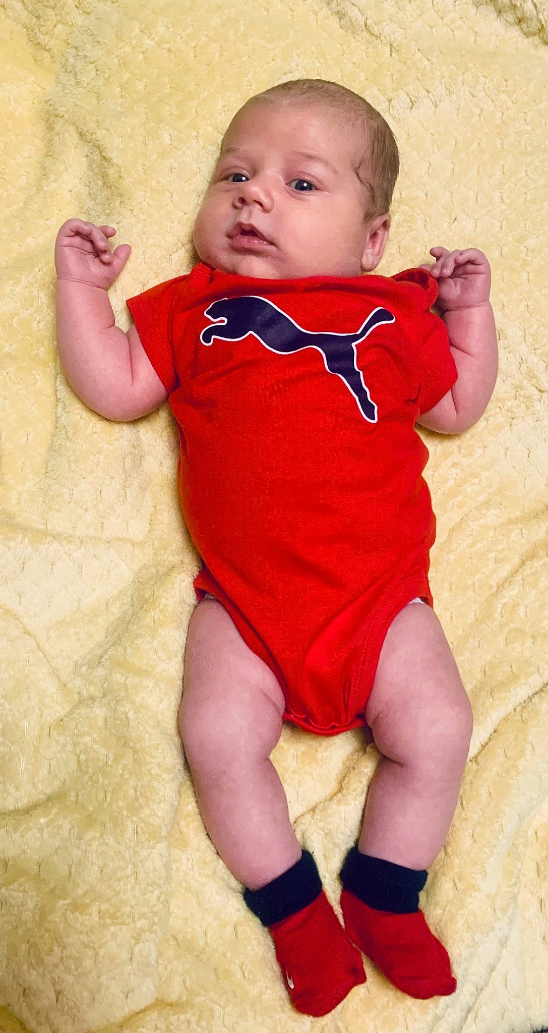 Micah joined the competition — help win amazing prizes! arm, baby_toddler_clothing, cheek, child, comfort, elbow, finger, hand, human_body, human_leg, joint, lip, muscle, organ, person, red, shoulder, skin, sleeve, thumb