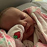 newborn, baby, sleeping, blanket, mitten, strawberry, pink, floral, infant, cute, peaceful, face, closeup, soft, resting, indoors, child, wrapped, toddler, portrait