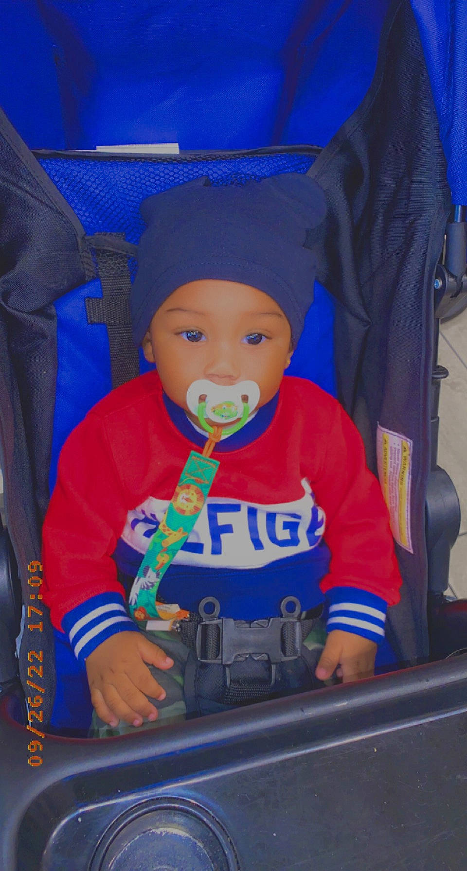 Jabari joined the competition — help win amazing prizes! baby, baby_carriage, baby_products, baby_safety, baby_toddler_clothing, car_seat, child, electric_blue, fun, headwear, person, personal_protective_equipment, play, room, sitting, toddler, trunk