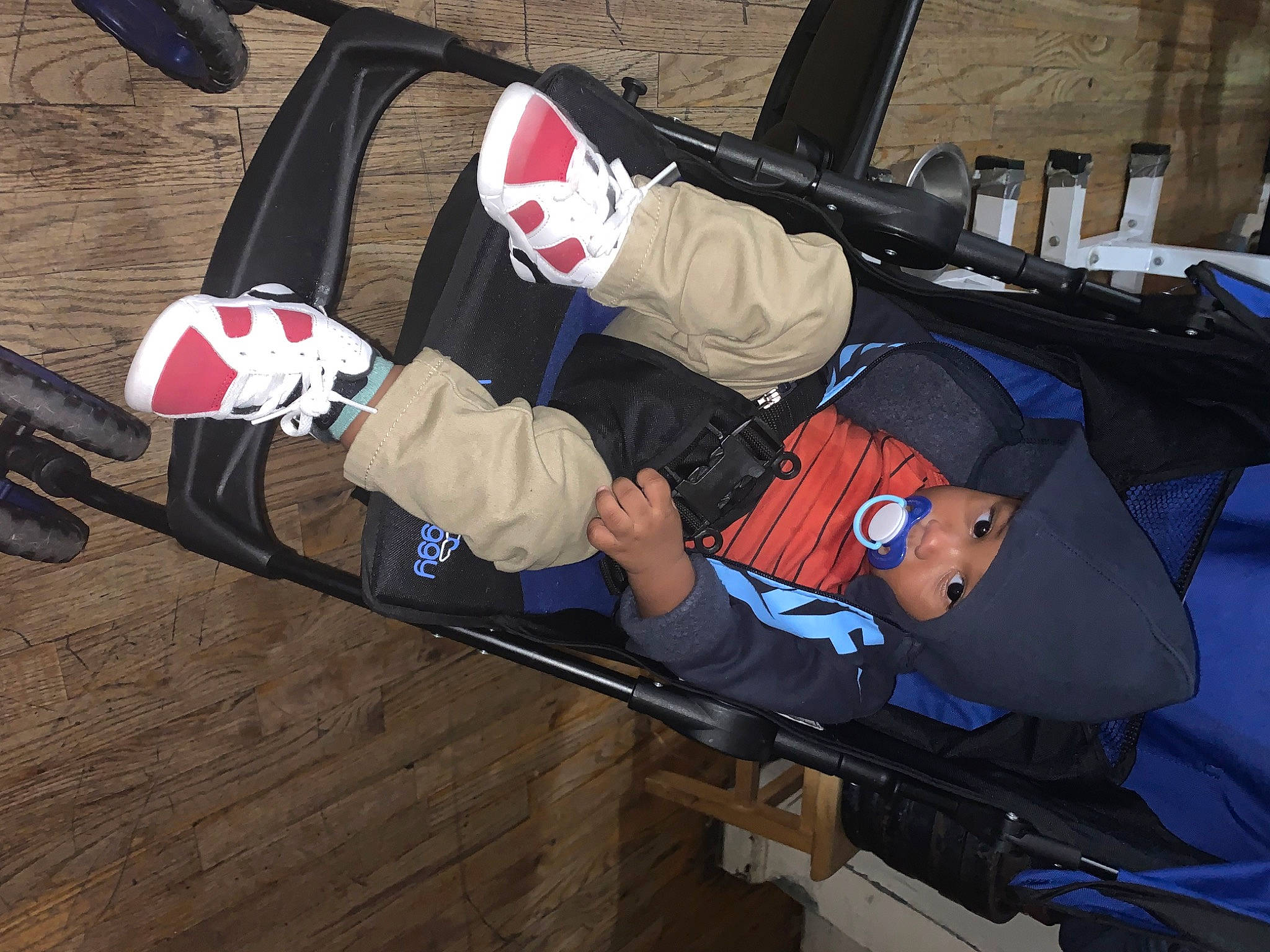 Jabari is registered to the contest to win money with this photo: automotive_design, automotive_exterior, automotive_tire, bag, boot, bumper, carmine, flooring, glove, hat, headwear, helmet, luggage_and_bags, outdoor_shoe, person, personal_protective_equipment, rolling, sports, sports_gear, tire