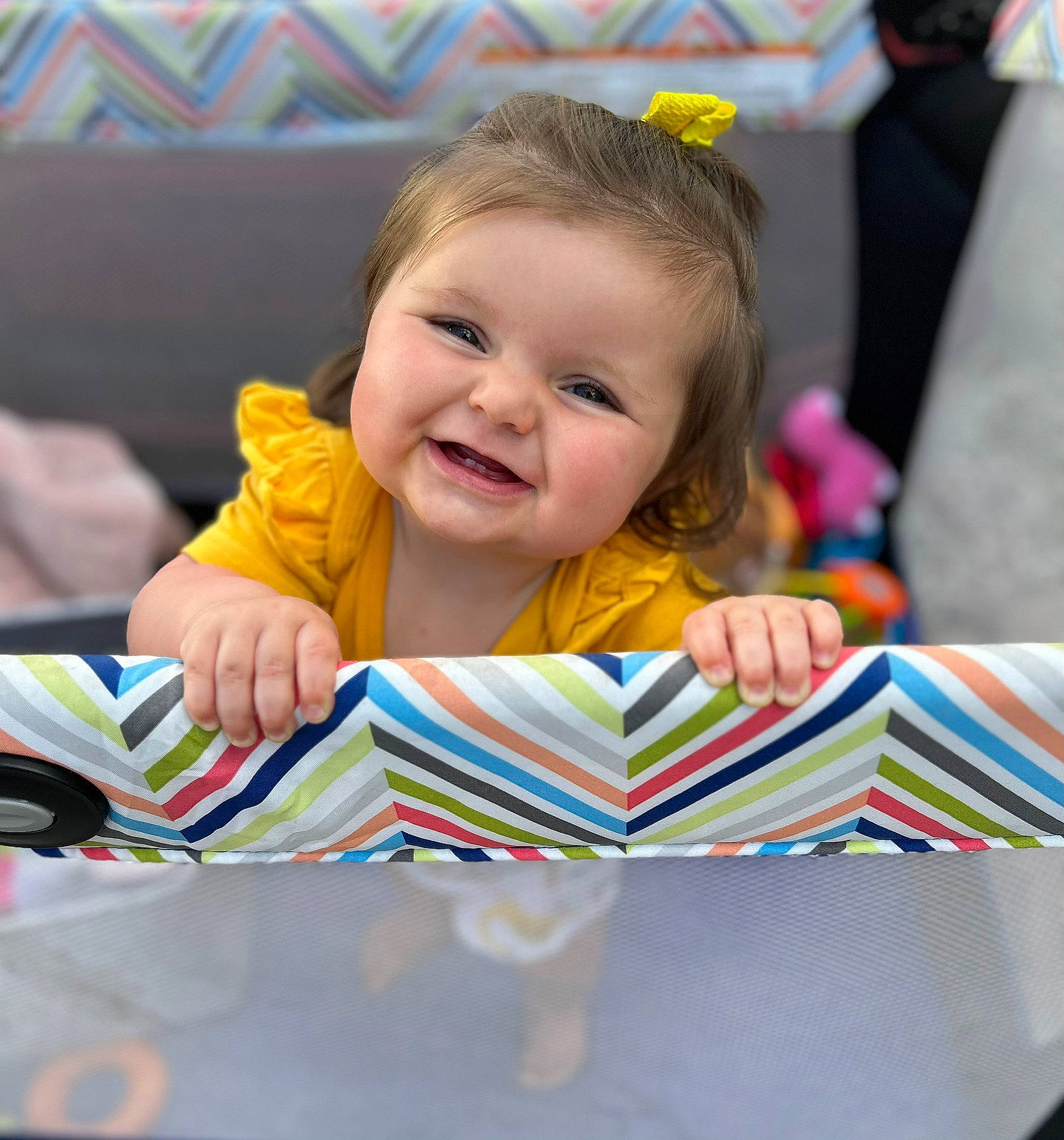 Everleigh is registered to the contest to win money with this photo: baby, baby_playing_with_toys, baby_products, beauty, chair, child, event, facial_expression, fun, happy, joy, leisure, person, pink, play, product, recreation, room, sitting, smile