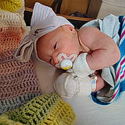 Tellisa joined the competition — help win amazing prizes! newborn, baby, infant, pacifier, mittens, headband, bow, blanket, hospital, sleeping, cute, wrapped, closeup, child, soft, knitted, colorful, resting, person, indoors