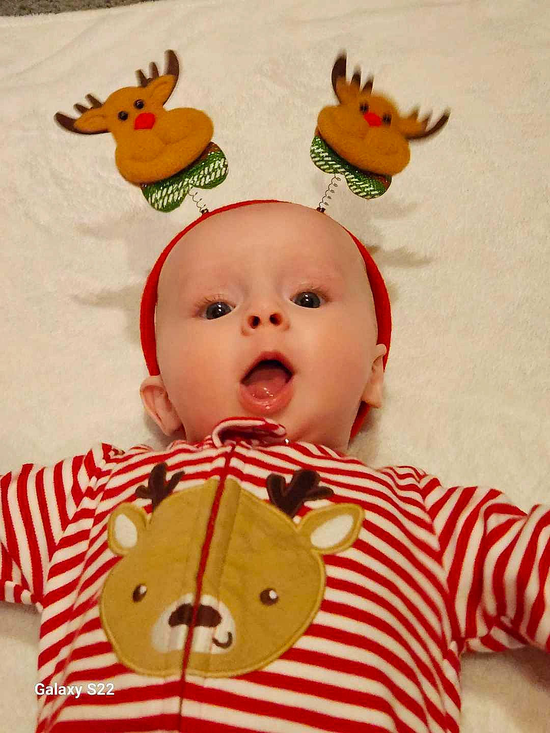 John is registered to the contest to win money with this photo: baby, baby_products, baby_toddler_clothing, baby_toys, cheek, child, costume_hat, fictional_character, fun, fur, happy, orange, pattern, person, plush, red, sleeve, smile, stuffed_toy, surprise