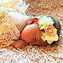 Lilyanah Andre is registered to the contest to win money with this photo: baby, newborn, sleeping, headband, flower, soft_blanket, pink, cute, infant, peaceful, closeup, portrait, resting, delicate, skin, child, tender, adorable, cozy, cute_outfit