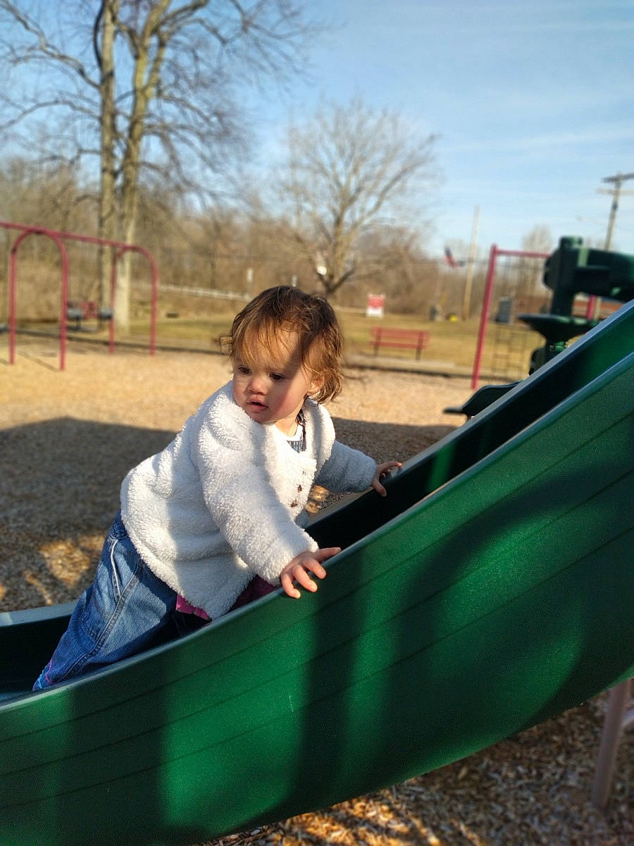 Amoura joined the competition — help win amazing prizes! asphalt, chute, city, fun, grass, jacket, leisure, outdoor_play_equipment, outdoor_recreation, people_in_nature, person, playground, playground_slide, recreation, shade, sky, swing, t_shirt, tints_and_shades, toddler