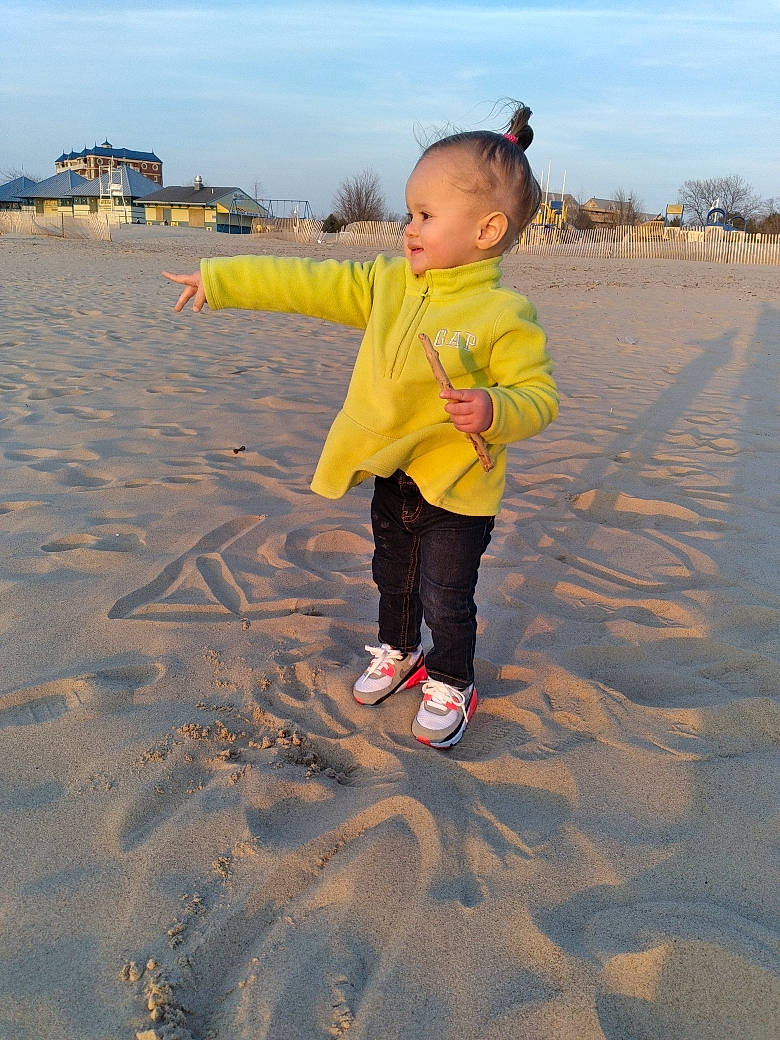 Amoura joined the competition — help win amazing prizes! baby_toddler_clothing, beach, body_of_water, cloud, coast, ecoregion, fun, happy, horizon, landscape, natural_environment, people_in_nature, person, recreation, sand, shore, sky, sleeve, summer, toddler
