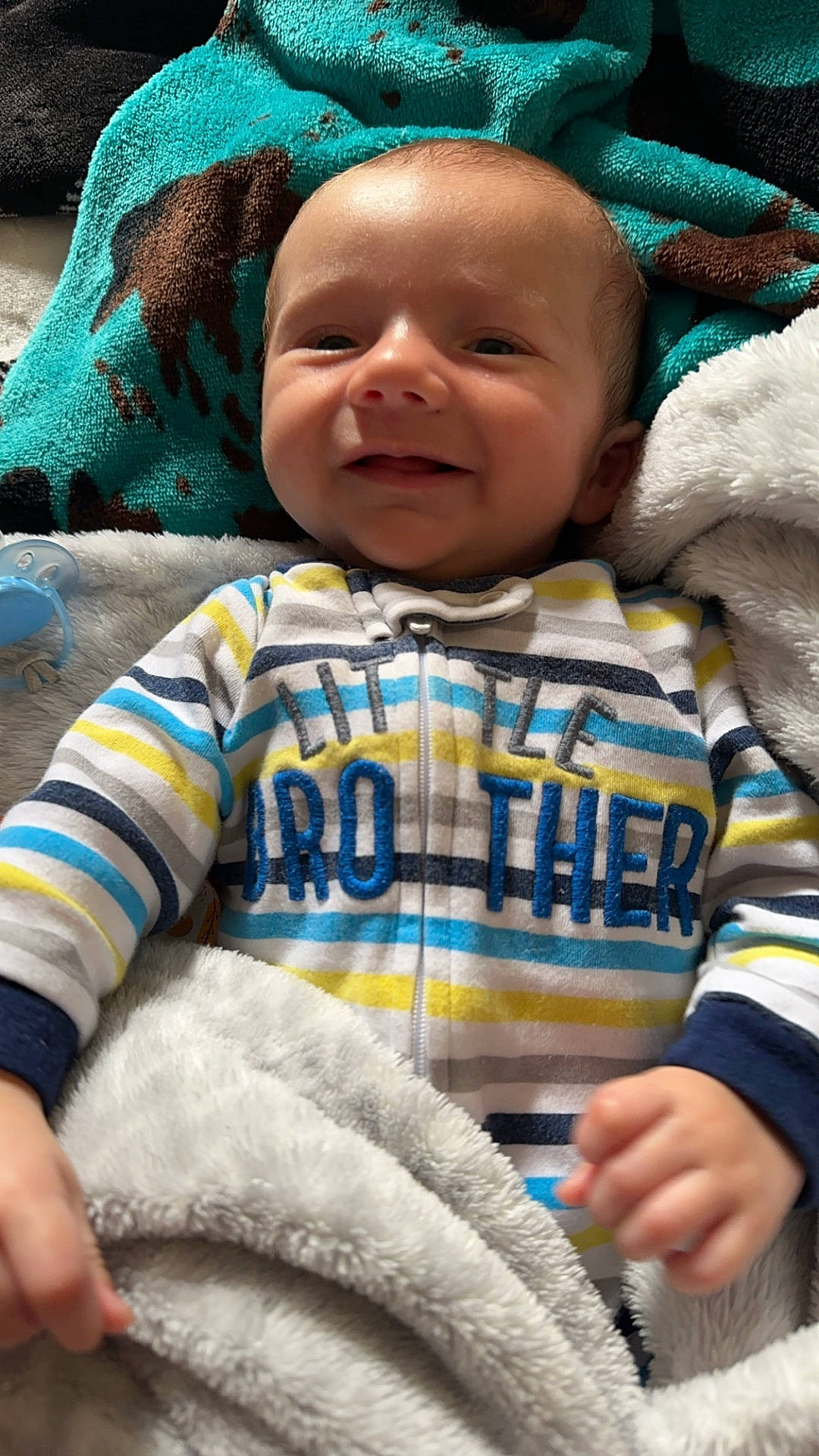 Kayden joined the competition — help win amazing prizes! baby, blanket, bodypart, clothing, face, finger, hand, happy, head, homedecor, knitwear, newborn, person, photography, portrait, quilt, smile, sweater, t_shirt, towel