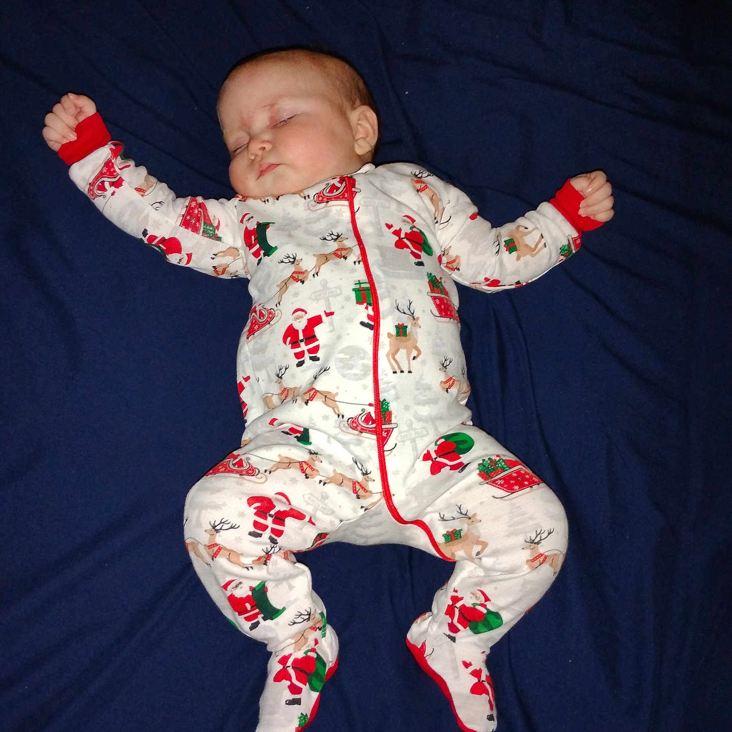 Zion joined the competition — help win amazing prizes! baby, bed, bodypart, clothing, face, finger, formalwear, furniture, glove, hand, head, hosiery, newborn, pajamas, person, photography, portrait, sleeping, sock, suit