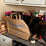 animal, cabinets, calico, cat, cats, countertop, food, funny, groceries, home, indoors, kitchen, paper_bag, pet, playful, shopping_bag, snacks, tortoiseshell, walmart, white_paw