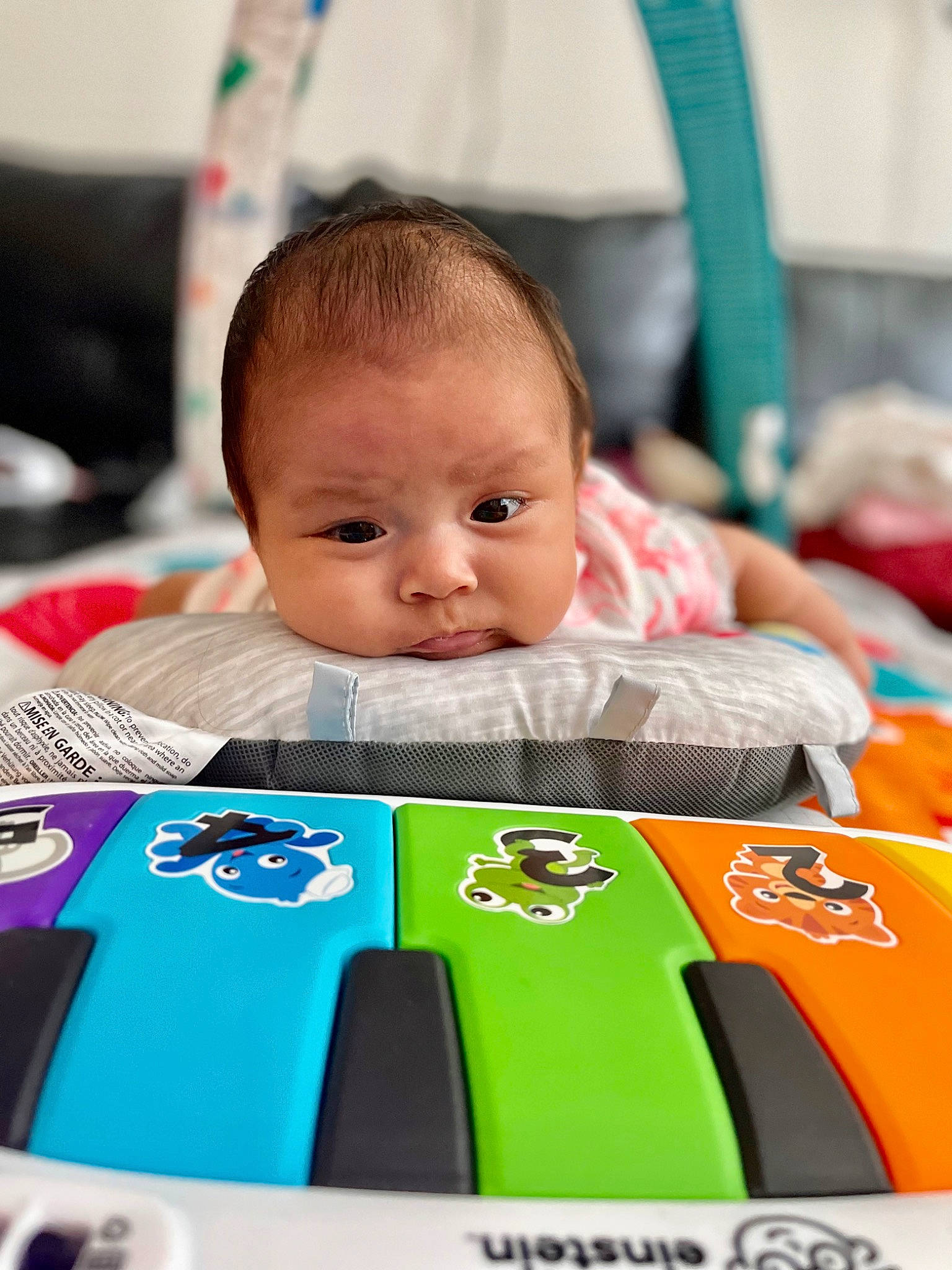 Charlotte is registered to the contest to win money with this photo: automotive_design, baby, baby_products, child, facial_expression, font, fun, gadget, games, hairstyle, happy, person, personal_protective_equipment, photography, play, product, recreation, room, sitting, snapshot
