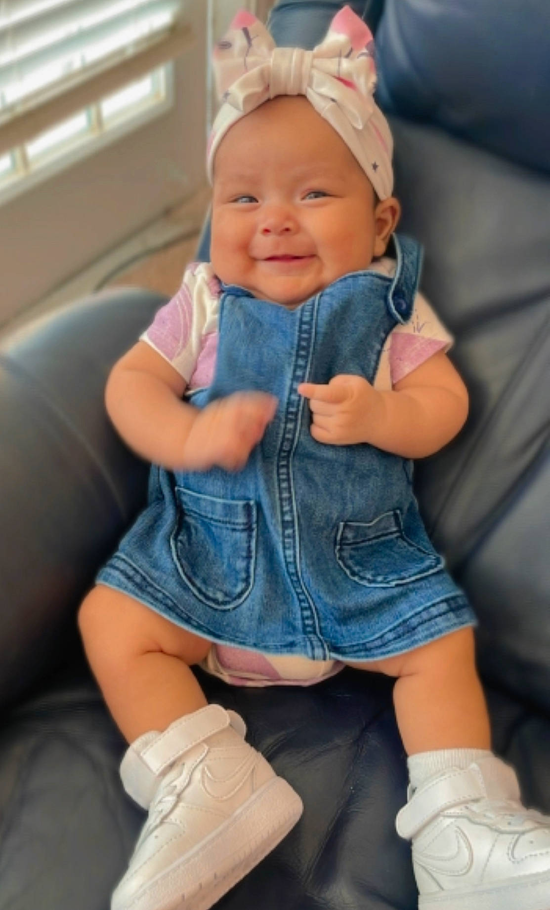 Charlotte is registered to the contest to win money with this photo: baby, baby_toddler_clothing, clothing, comfort, eye, facial_expression, finger, happy, head, headwear, human, joint, joy, leg, mouth, organ, person, skin, sleeve, smile