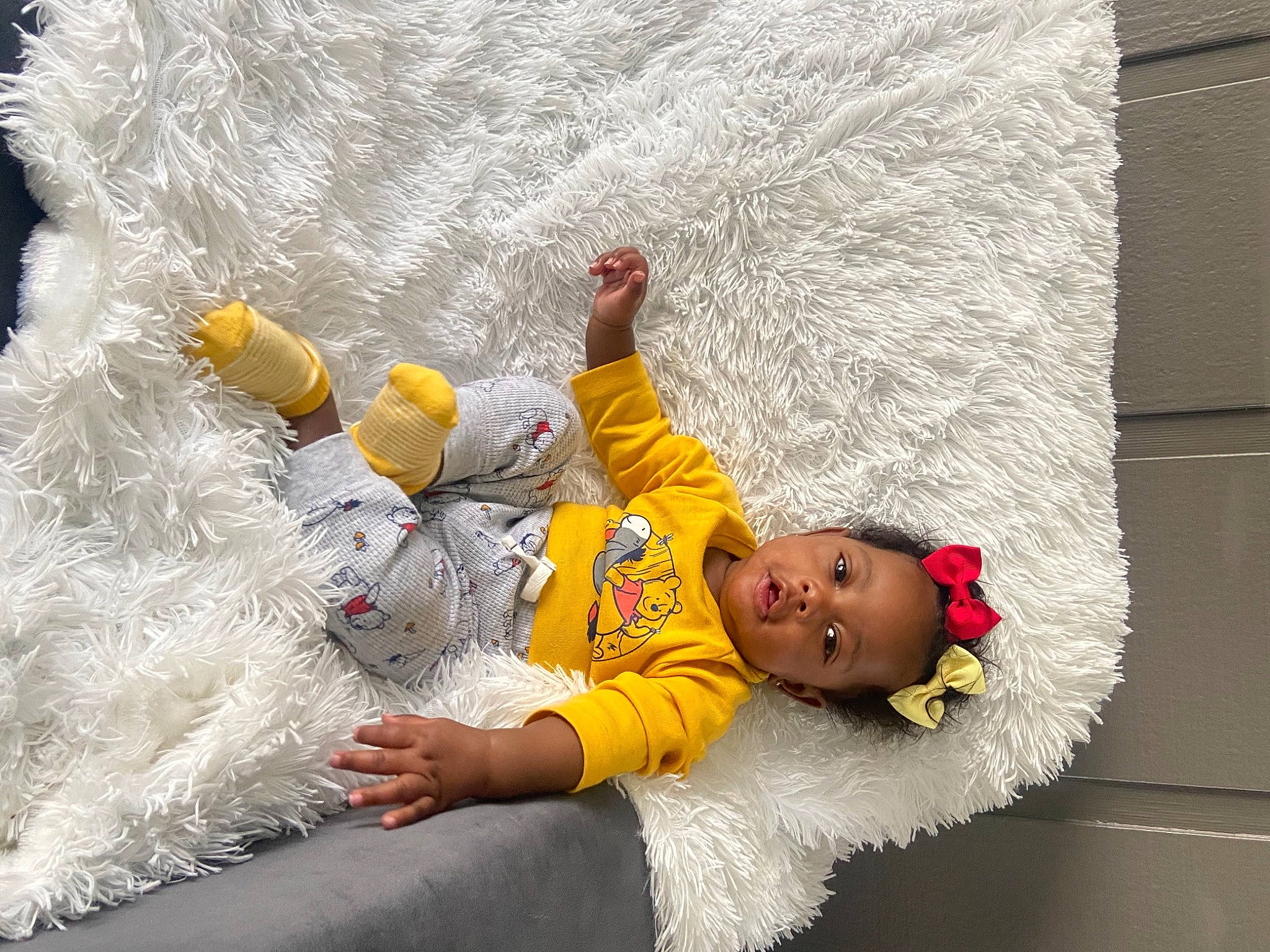 Amiriyae is registered to the contest to win money with this photo: baby, event, flower, freezing, fun, fur, glove, grass, hand, happy, leisure, organism, person, photograph, plant, recreation, sitting, toddler, tree, white