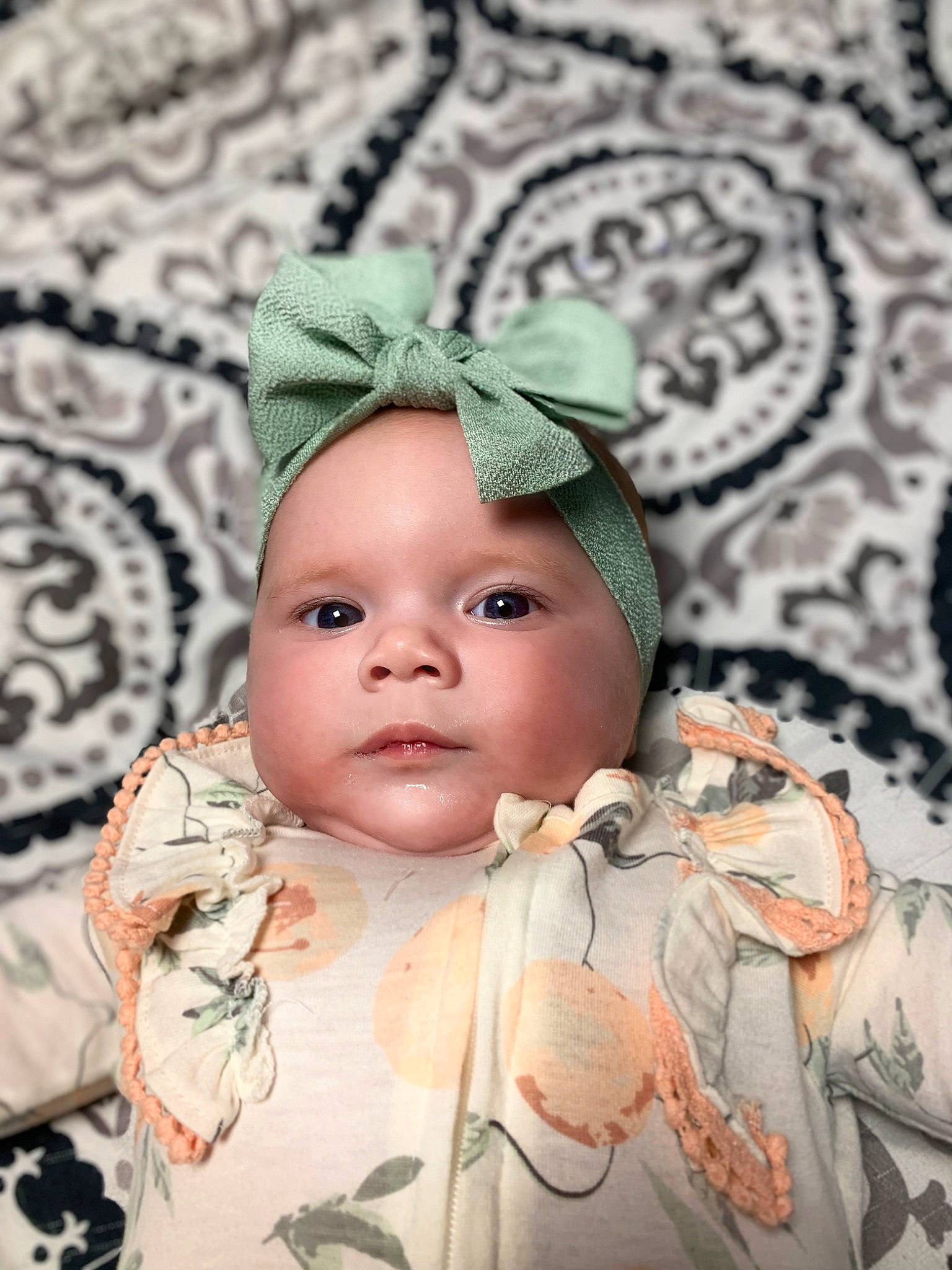 Lillian joined the competition — help win amazing prizes! baby, cap, cheek, costume_hat, creative_arts, doll, dress, eye, eyebrow, eyelash, grass, head, headgear, headwear, knit_cap, pattern, person, skin, textile, toddler