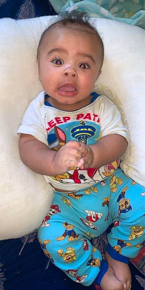 Ermys joined the competition — help win amazing prizes! baby, baby_toddler_clothing, cheek, child, chin, face, facial_expression, finger, happy, human_body, iris, lip, neck, nose, organ, person, sitting, skin, sleeve, t_shirt