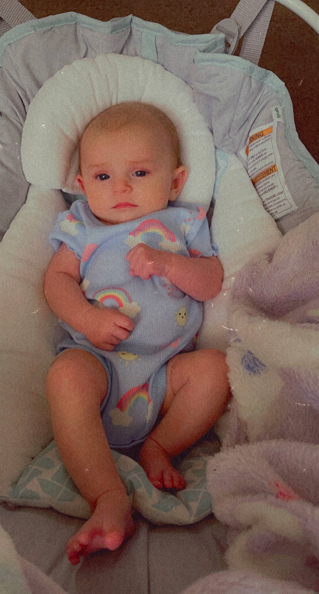 Micaela is registered to the contest to win money with this photo: abdomen, baby, baby_products, baby_sleeping, baby_toddler_clothing, cheek, child, comfort, finger, headgear, lap, linens, lip, person, pink, skin, stomach, textile, thigh, toddler